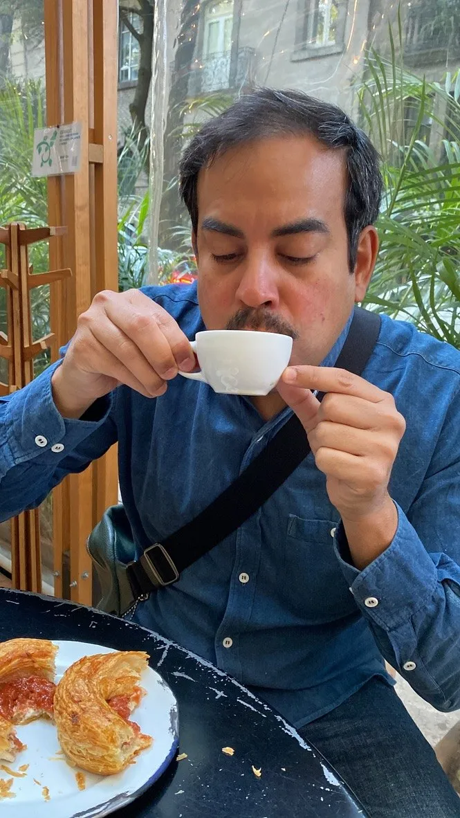 Danny Mosquera tasting a coffee
